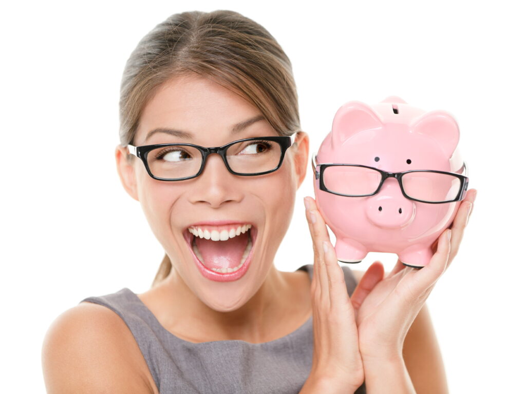 Happy woman with nerdy piggy bank